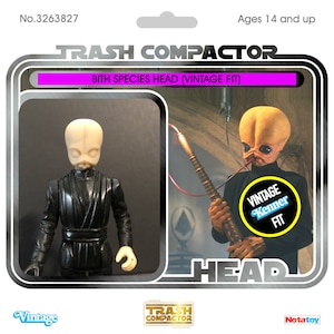Puede incluir: Figura de acción vintage "Trash Compactor" con una cabeza de la especie Bith. La figura es negra con una cabeza de color claro. El embalaje incluye el texto "Vintage Kenner Fit" y "Ages 14 and up."