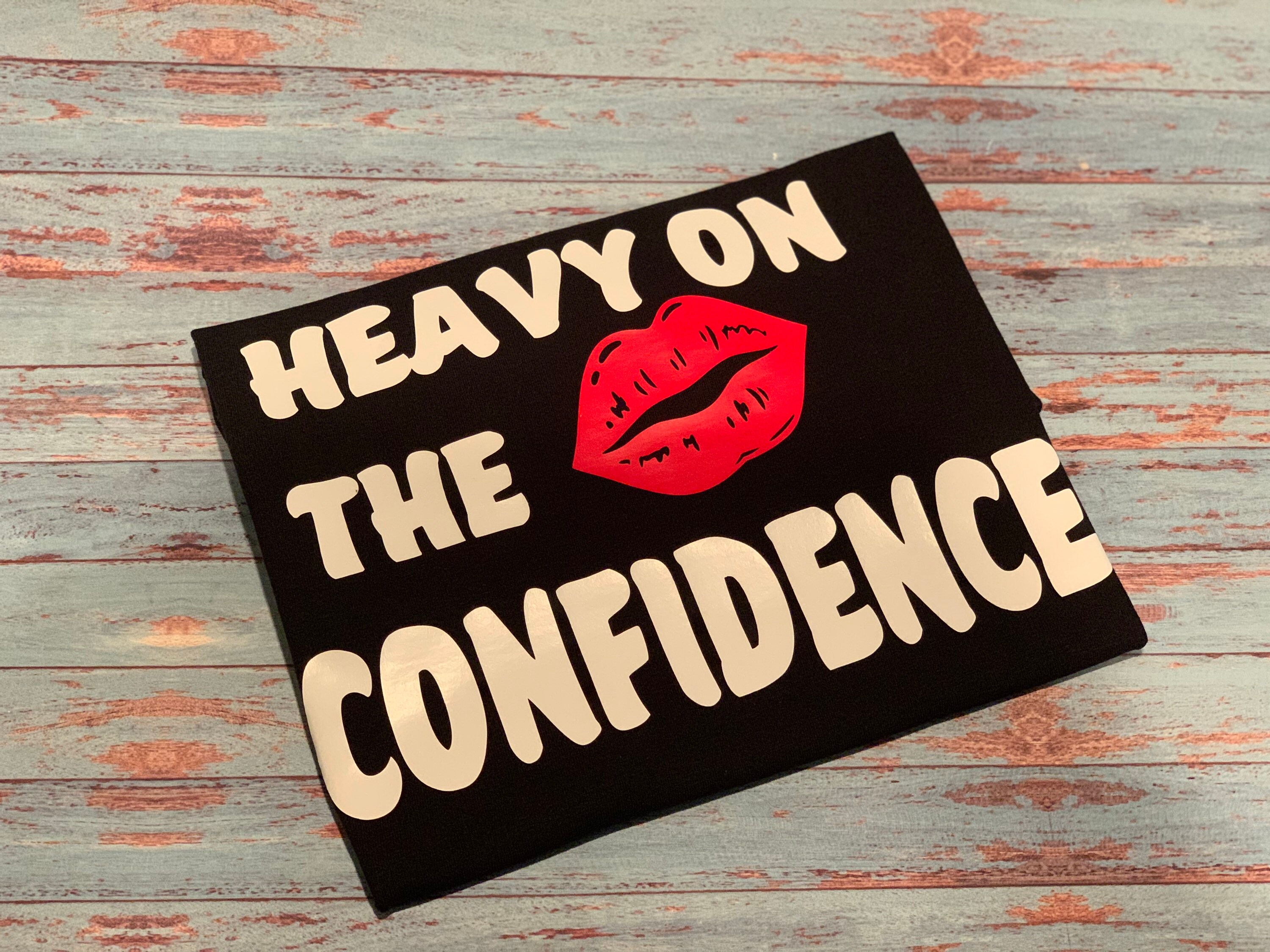 heavy on the confidence shirt
