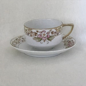 Antique Nippon fine porcelain hand painted cup and saucer set