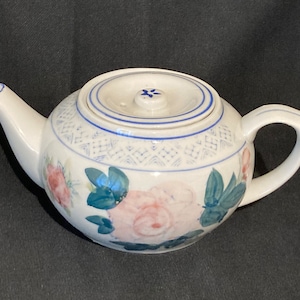 Chinese teapot with hand painted pink floral design