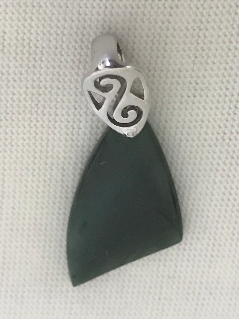 New Zealand greenstone pendant set in sterling silver