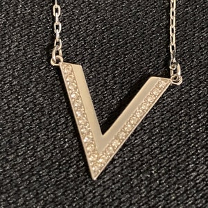 Swarovski delta necklace discount