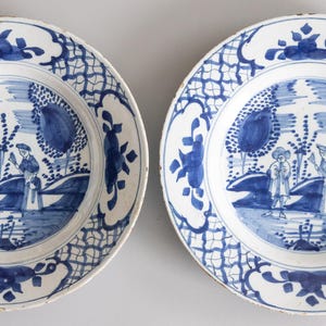 Rare 18th century Chinoiserie Delft Plates with Figures, a Pair