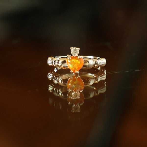 Fire opal claddagh ring deals