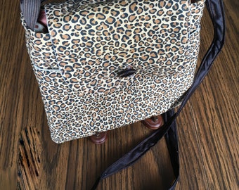 animal print sling bolsa