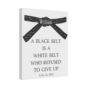 May include: A white canvas print with a black belt made of words. The belt is tied in a knot and the words are related to martial arts. The text below the belt reads "A black belt is a white belt who refused to give up." The date June 22, 2024 is printed below the text.