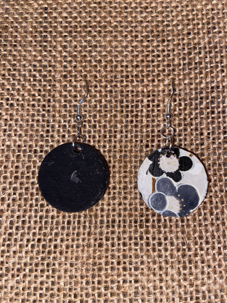 Black painted small wooden circles with fun Italian paper.