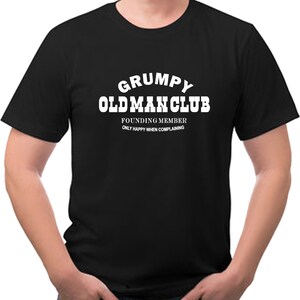 May include: Black t-shirt with white text that reads "Grumpy Old Man Club" and "Founding Member Only Happy When Complaining."