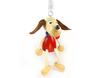 Schwingfigur Hund / Dackel, Schwingtier Holz Hüpfer, Ziehfigur Feder Jumper Federfigur Holzschwinger für Wickeltisch / Kinderbett