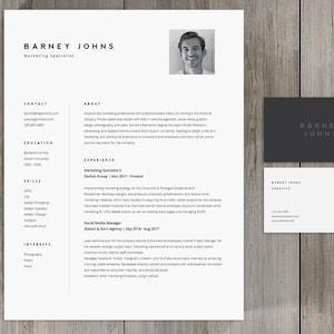 May include: A black and white CV with a headshot of a man. The CV is for Barney Johns, a Marketing Specialist. The CV includes contact information, education, skills, experience, and interests.