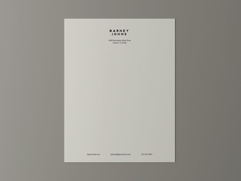 May include: A cream-colored letterhead with the text "BARNEY JOHNS" in a minimalist black font at the top. Below the name are the address and contact information. The paper is centered on a gray background.