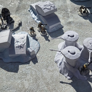 May include: A collection of unpainted gray resin miniature wargaming terrain pieces and soldier figurines. The set includes two bunker structures, three cylindrical turret emplacements, a radar dish, and several small infantry figures.