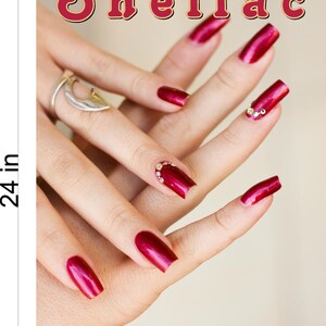 May include: A close-up of hands with red gel manicures and rhinestones. The text "Shellac Manicure" is at the top of the image.