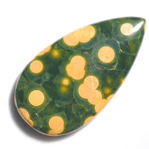 May include: A teardrop-shaped green and yellow stone with a speckled pattern. The stone has a smooth, polished surface.