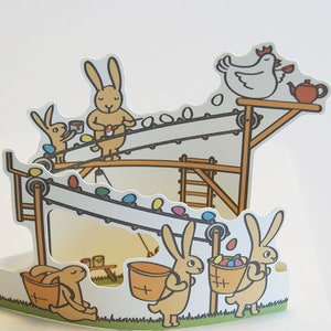 Pop-up card Easter Bunny Factory Easter card Easter cards Card for Easter with Easter bunnies, Easter eggs and chicken, Happy Easter image 1