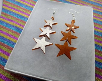 Gold star earings