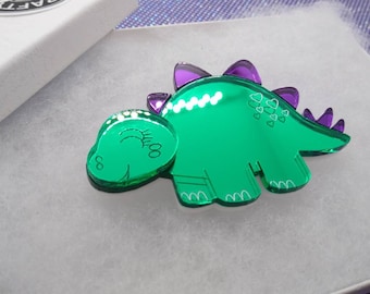 Dinosaur brooch