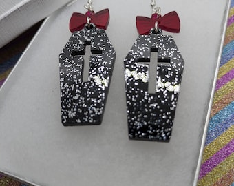 Coffin earrings:Sparkly Black Coffin Earrings with a Mirror Red Acrylic Bow, Lasercut Statement Earrings ideal for Halloween