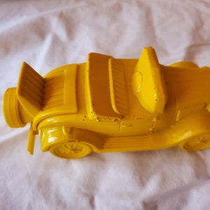 Avon collector after shave decanter yellow car
