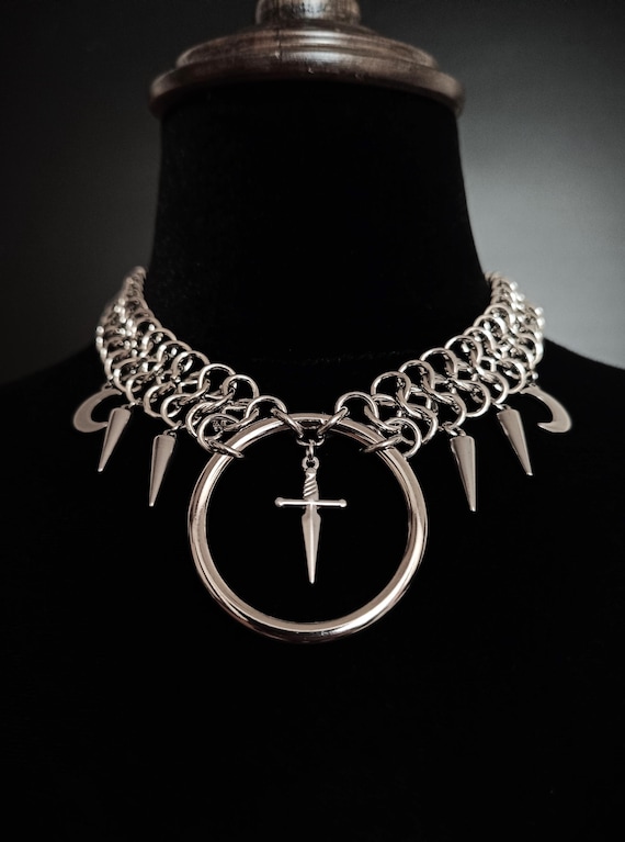 Witch chainmail necklace with dagger, crescent moons and spiked cones in stainless steel