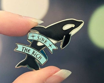 Sink the Rich hard enamel pin