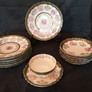 Vintage Imperial China Austria Porcelain 13 Piece Set includes 1 Teacup, 6 Saucer plus 6 Dessert/Bread Plates