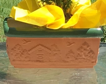 Rustic, southwest-style terracotta-look, scenic, ceramic planter/succulent planter with green trim