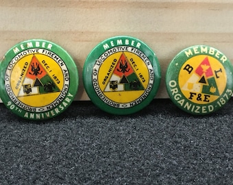 Three, small, vintage, Brotherhood of Locomotive Firemen and Enginemen lapel pins