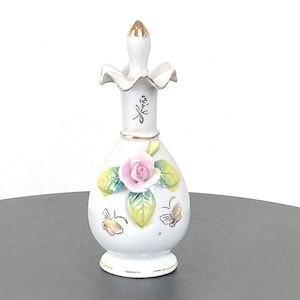 Vintage, ceramic, floral and butterfly perfume bottle with dauber