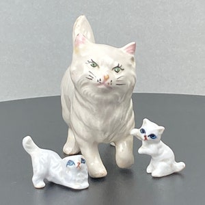 Unbranded, small white ceramic cat and two miniature white kittens