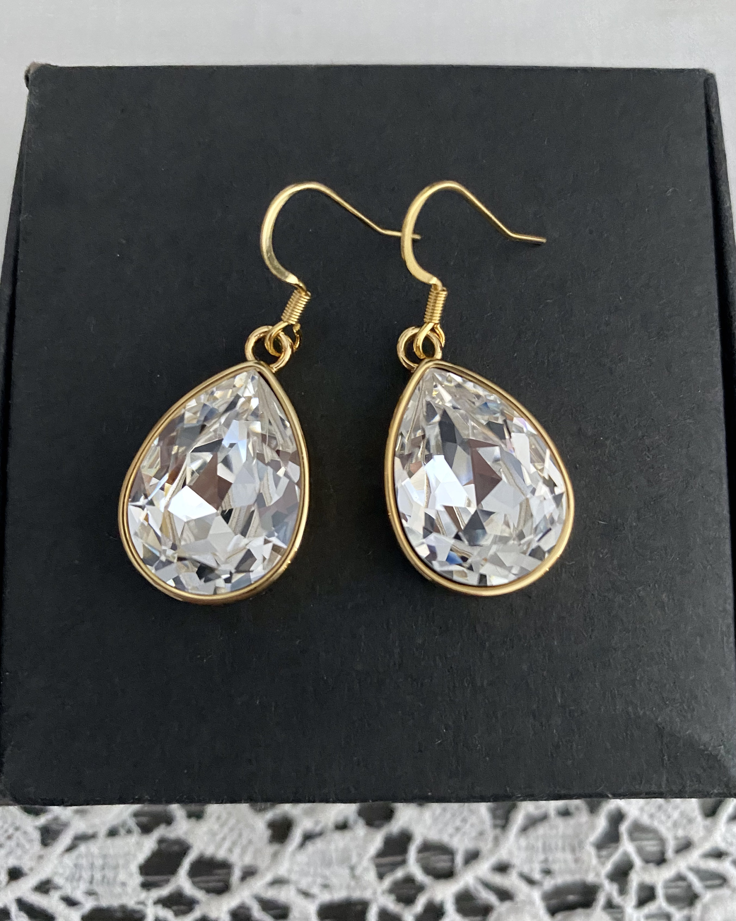 Swarovski clear pear earrings/gold coloured pear shape | Etsy