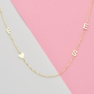 14k gold initial necklace 1 initial necklace 2 initial necklace 3 initial necklace 4 initial necklace Sideways initial necklace image 1