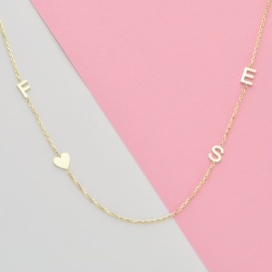 14k gold initial necklace 1 initial necklace 2 initial necklace 3 initial necklace 4 initial necklace Sideways initial necklace image 1