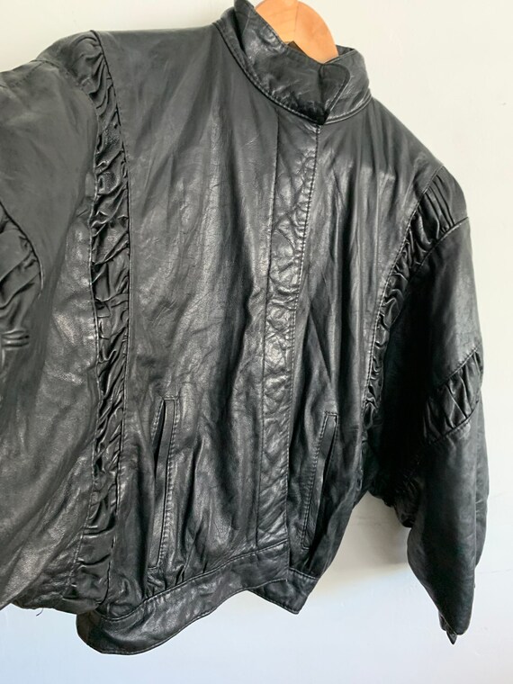 Vintage black leather ruffle jacket