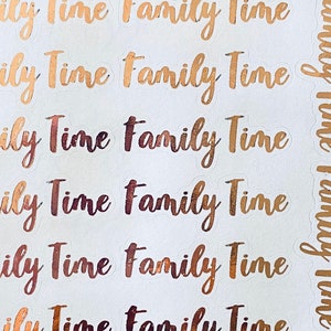 May include: A sheet of gold and copper foil stickers with the text "Family Time" repeated multiple times.