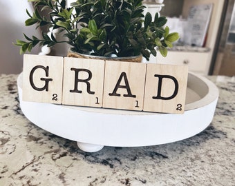 Graduation centerpiece Custom |Tiered Tray Decor | 3D laser cut wood | Party Decorations | Class of 2026 | Grad Scrabble Sign