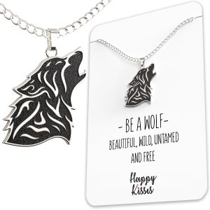 May include: A silver necklace with a black and silver wolf pendant. The pendant has a tribal design. The necklace comes with a card that says "Be a wolf - beautiful, wild, untamed and free" and "Happy Kisses".