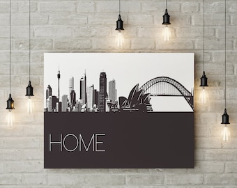 May include: Black and white illustration of the Sydney Opera House and Harbour Bridge with the word "HOME" printed below. The illustration is on a white background with a black border.