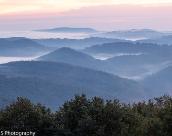 Sunrise Photo Of GrandFather Mountain Off Of The Blue Ridge Parkway With Clouds Going Over The Mountain - North Carolina