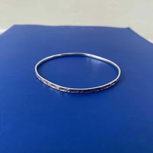 Beautiful stamped vintage silver bangle for her