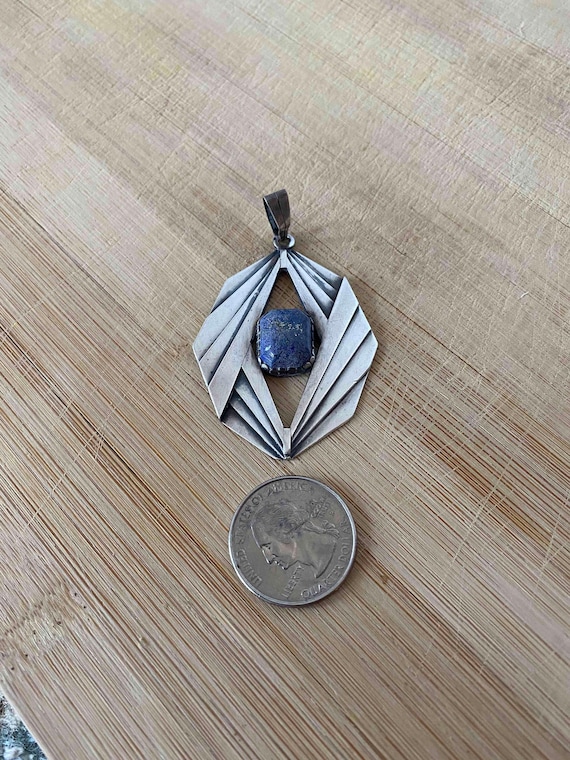 Lapis lazuli and silver pendant