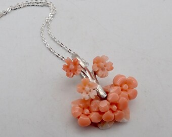 Japanese deep sea coral floral necklace. Carved pink coral flower necklace. Pink coral cherry blossom pendant. Natural, not dyed pink coral.