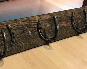 Horseshoe hook coat rack