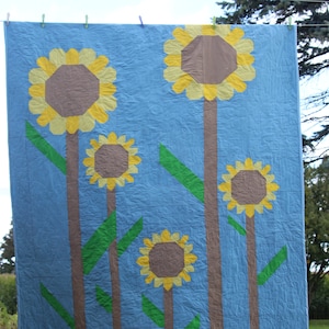 Zonnebloemdekbed