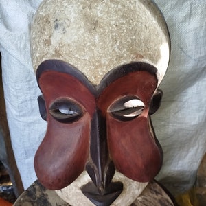 On Sale Striking Brown and White Suku Mask: A Symbol of Mystery and Allure Symbolic DRC congo African Wall Hanging Ceremonial Yellow