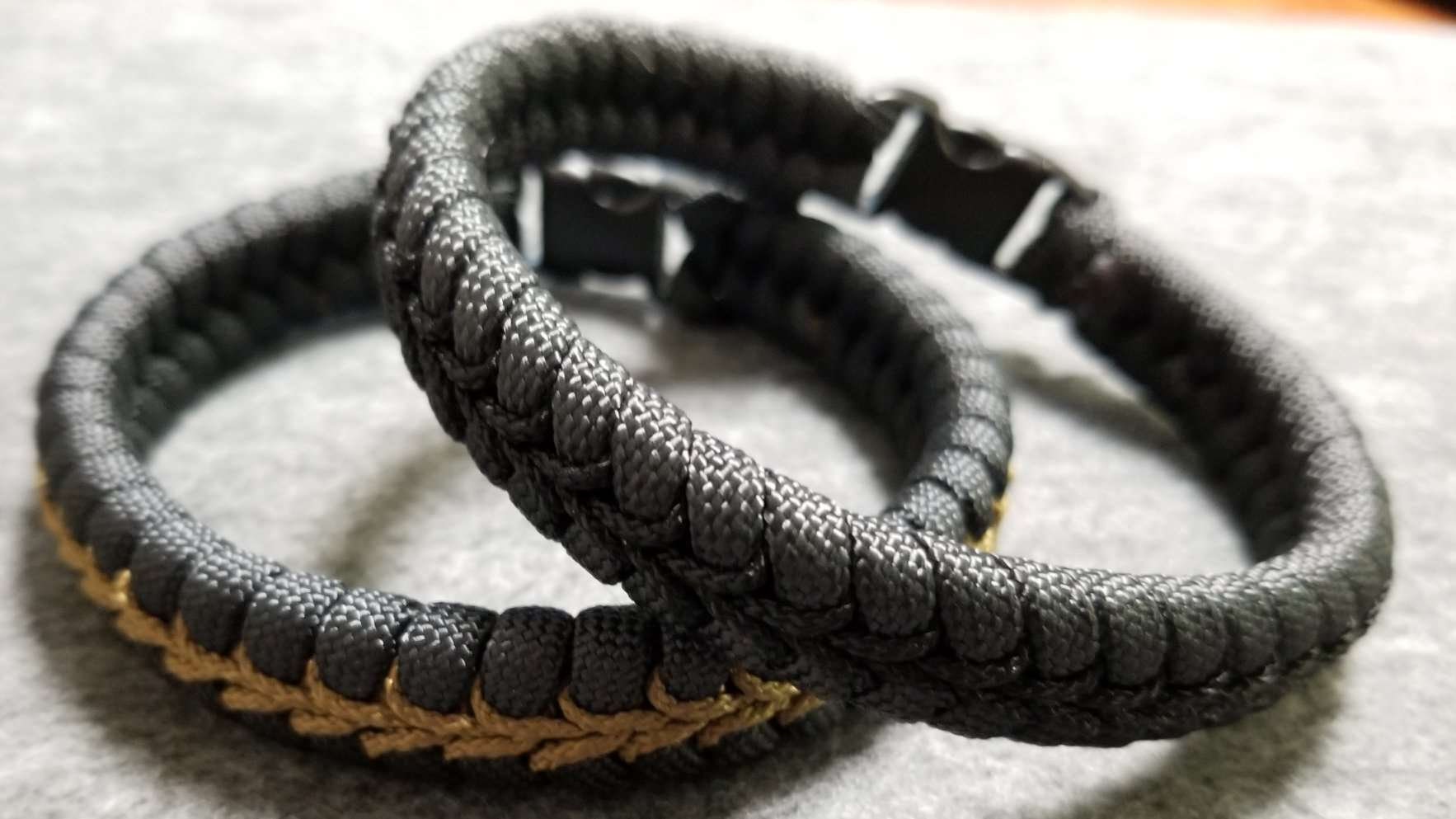 Black Paracord Fishtail Bracelet with Coyote Center Stitch. 7.50 / Plastic Buckle - Included