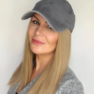 Grey baseball cap with long hair attached