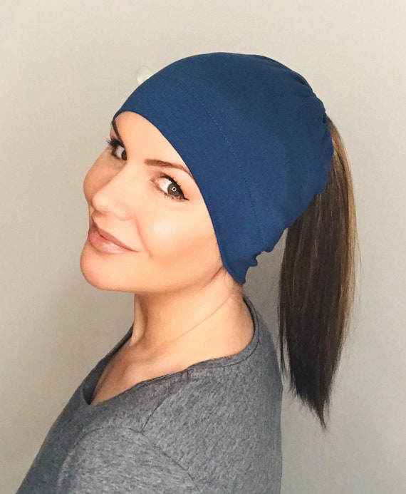 Petrol Hat With Ponytail Wig Attached 