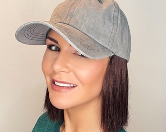 Grey baseball cap with short hair attached| hat wig| hat with hair attached| hat with hair| cap with hair| hat hair| hair hat| sports cap