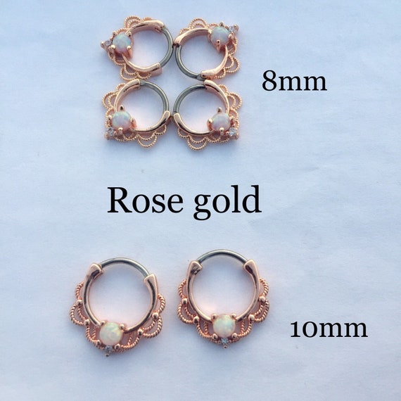 White Synthetic Opal Fire opal Septum Clicker Nose Ring Hoop Surgical Steel piercing 6x10 wearable length 1/4 14g sold by PLAYFUL PIERCINGS White Synthetic Opal Fire opal Septum Clicker Nose Ring Hoop Surgical Steel piercing 6x10 wearable length 1/4 14g sold by PLAYFUL PIERCINGS